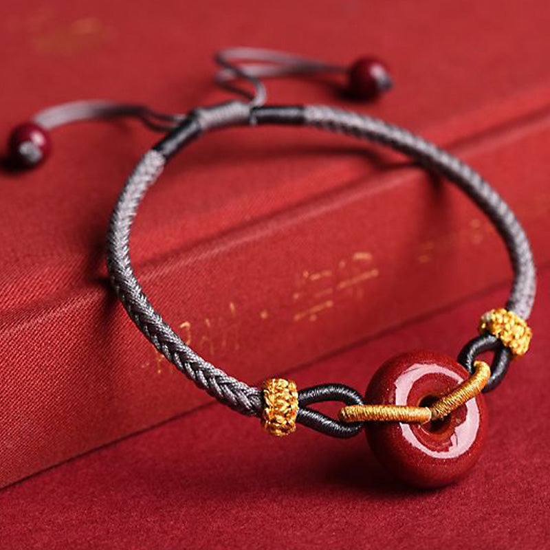 Bransoletka pleciona z ręcznie robionej klamry Cinnabar Peace Buddha Stones