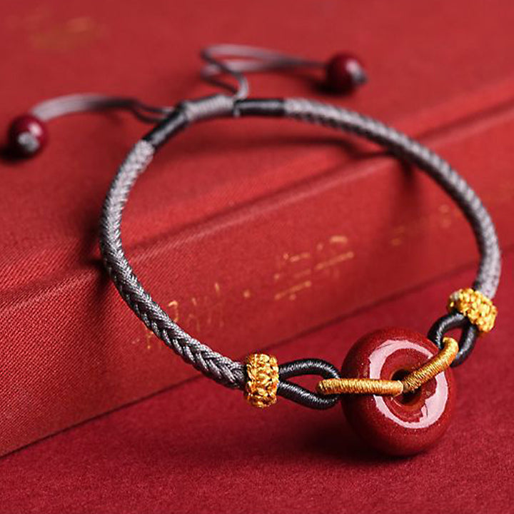 Bransoletka pleciona z ręcznie robionej klamry Cinnabar Peace Buddha Stones