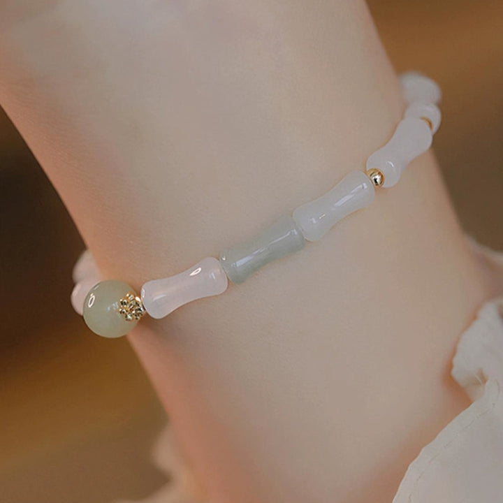 Bransoletka ochronna z Buddha Stones 14K pozłacana Hetian White Jade Bamboo Leaf