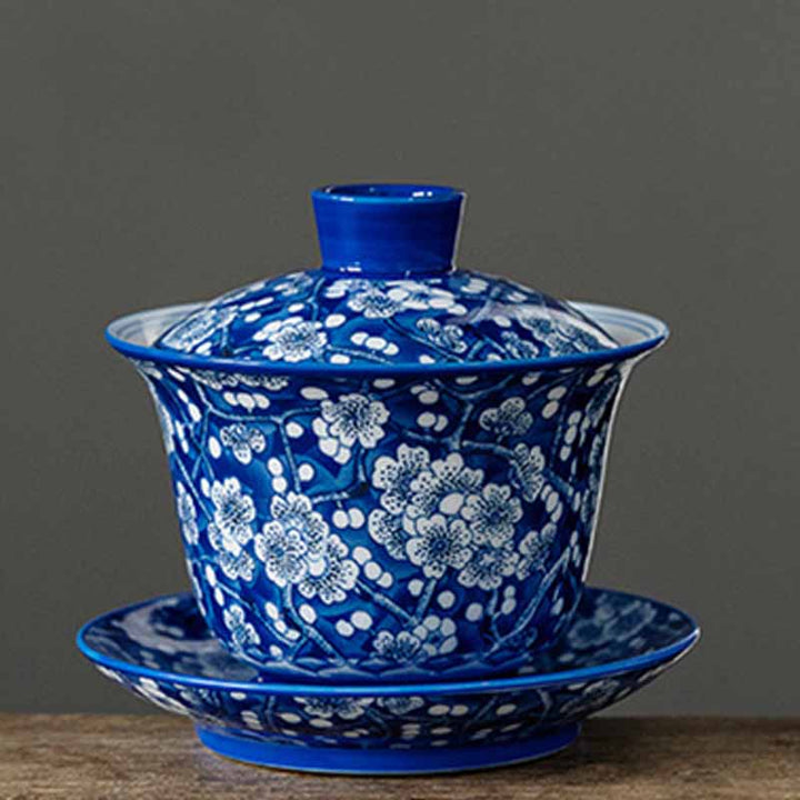 Buddha Stones Kwiat Śliwy Niebieski I Biały Porcelana Ceramiczna Gaiwan Sancai Filiżanka Do Herbaty Kung Fu Filiżanka Do Herbaty I Spodek Z Pokrywką 185 ml
