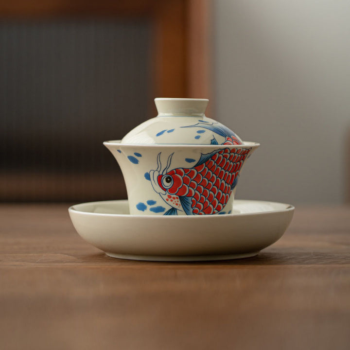 Buddha Stones Koi Fish Arowana Ceramic Gaiwan Sancai Filiżanka Kung Fu Filiżanka do herbaty z pokrywką 130ml