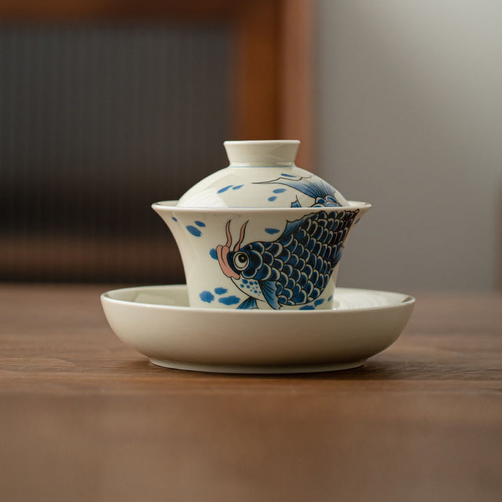 Buddha Stones Koi Fish Arowana Ceramic Gaiwan Sancai Filiżanka Kung Fu Filiżanka do herbaty z pokrywką 130ml