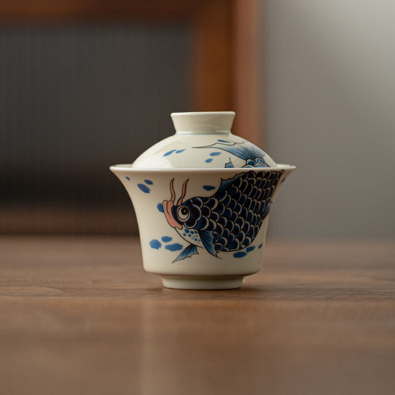 Buddha Stones Koi Fish Arowana Ceramic Gaiwan Sancai Filiżanka Kung Fu Filiżanka do herbaty z pokrywką 130ml