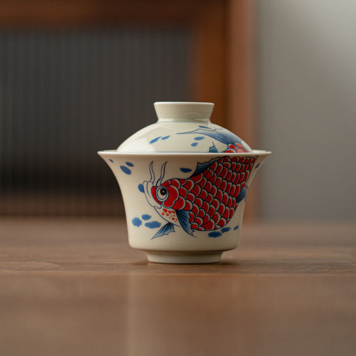 Buddha Stones Koi Fish Arowana Ceramic Gaiwan Sancai Filiżanka Kung Fu Filiżanka do herbaty z pokrywką 130ml