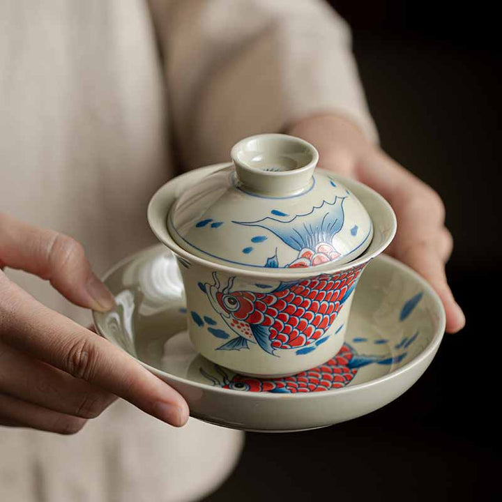 Buddha Stones Koi Fish Arowana Ceramic Gaiwan Sancai Filiżanka Kung Fu Filiżanka do herbaty z pokrywką 130ml