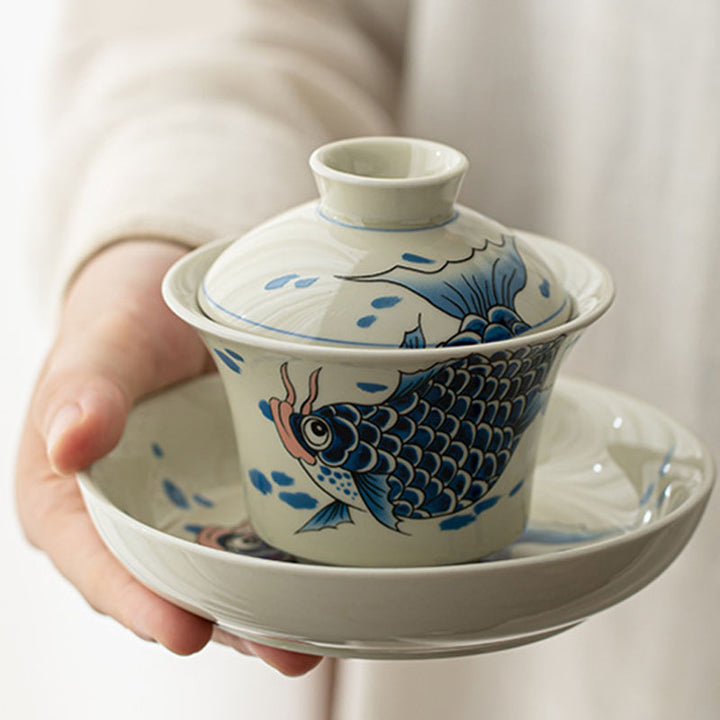 Buddha Stones Koi Fish Arowana Ceramic Gaiwan Sancai Filiżanka Kung Fu Filiżanka do herbaty z pokrywką 130ml