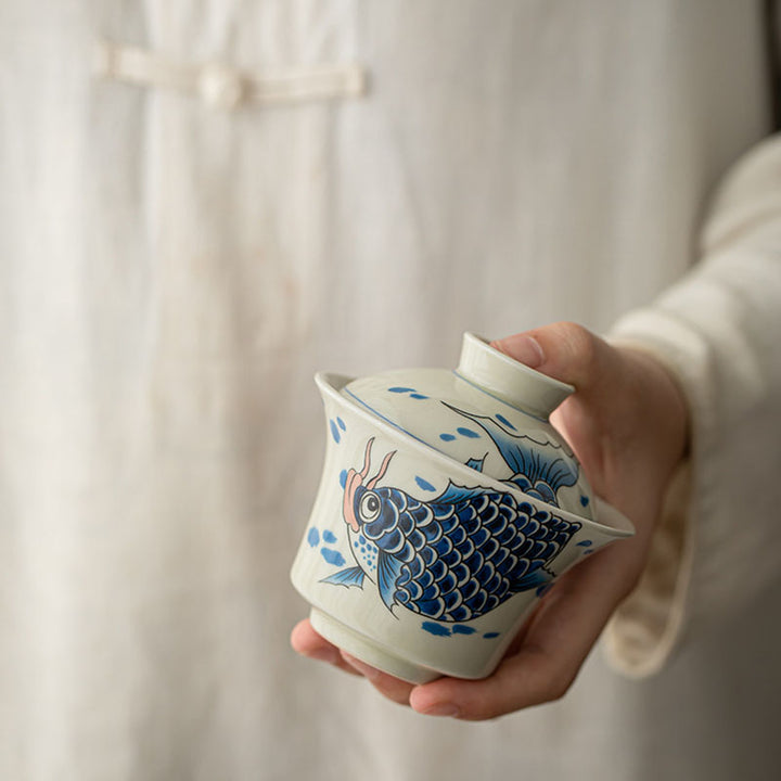 Buddha Stones Koi Fish Arowana Ceramic Gaiwan Sancai Filiżanka Kung Fu Filiżanka do herbaty z pokrywką 130ml