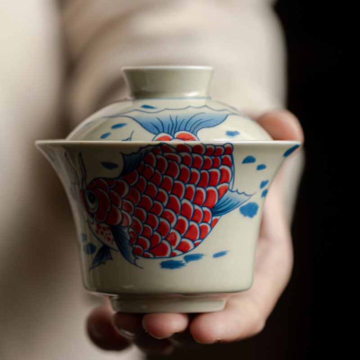 Buddha Stones Koi Fish Arowana Ceramic Gaiwan Sancai Filiżanka Kung Fu Filiżanka do herbaty z pokrywką 130ml