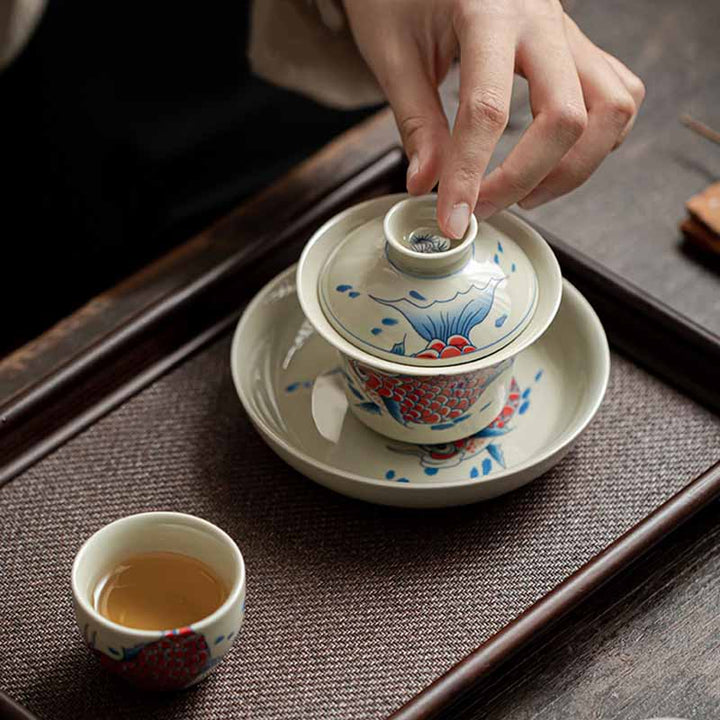 Buddha Stones Koi Fish Arowana Ceramic Gaiwan Sancai Filiżanka Kung Fu Filiżanka do herbaty z pokrywką 130ml