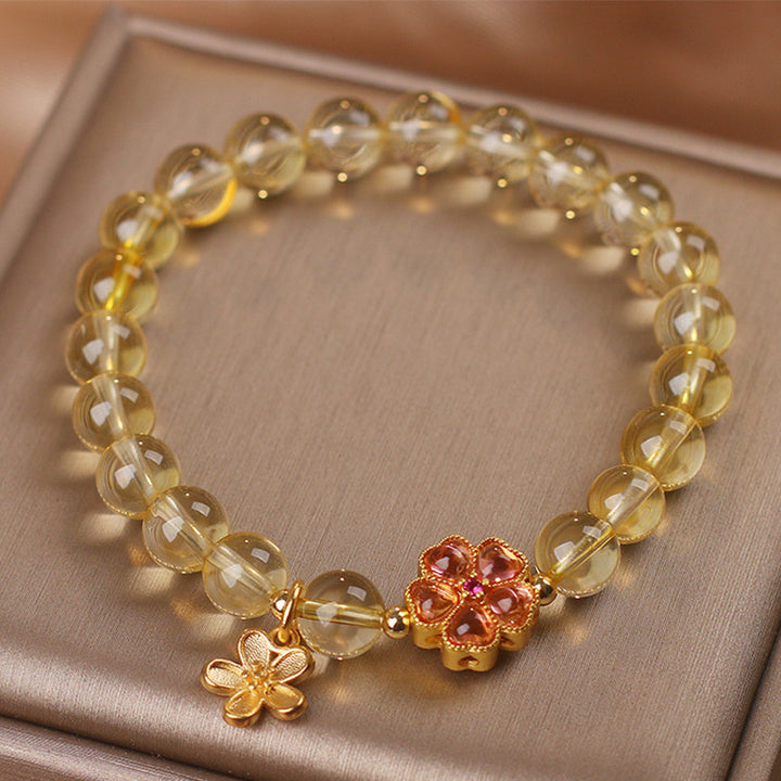 Bransoletka z naturalnym kwiatem cytrynu i Buddha Stones, ochrona dobrobytu