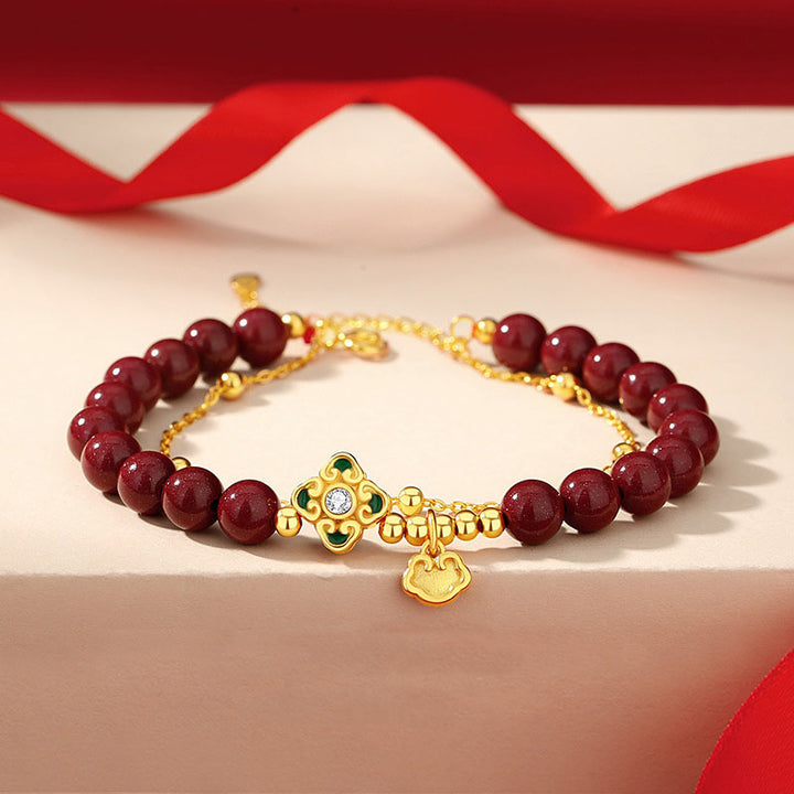 Bransoletka z Buddha Stones 925 ze srebra próby 925 z naturalnym cynobrem i czterolistną koniczyną