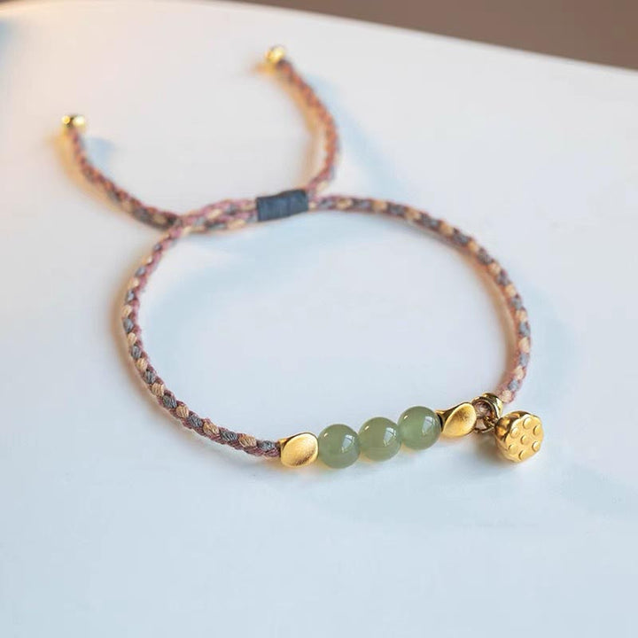 Bransoletka z ręcznie robionego hetian jadeitu z zawieszką lotosu i Buddha Stones, pleciona, szczęście