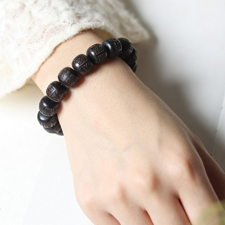 Buddha Stones Tybet Ebony Drewno Om Mani Padme Hum Grawerowana Bransoletka Równowagi