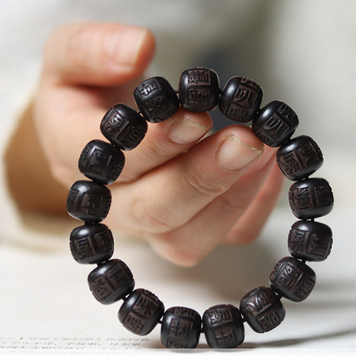 Buddha Stones Tybet Ebony Drewno Om Mani Padme Hum Grawerowana Bransoletka Równowagi