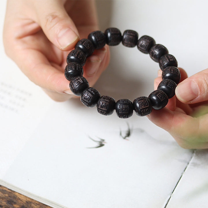 Buddha Stones Tybet Ebony Drewno Om Mani Padme Hum Grawerowana Bransoletka Równowagi