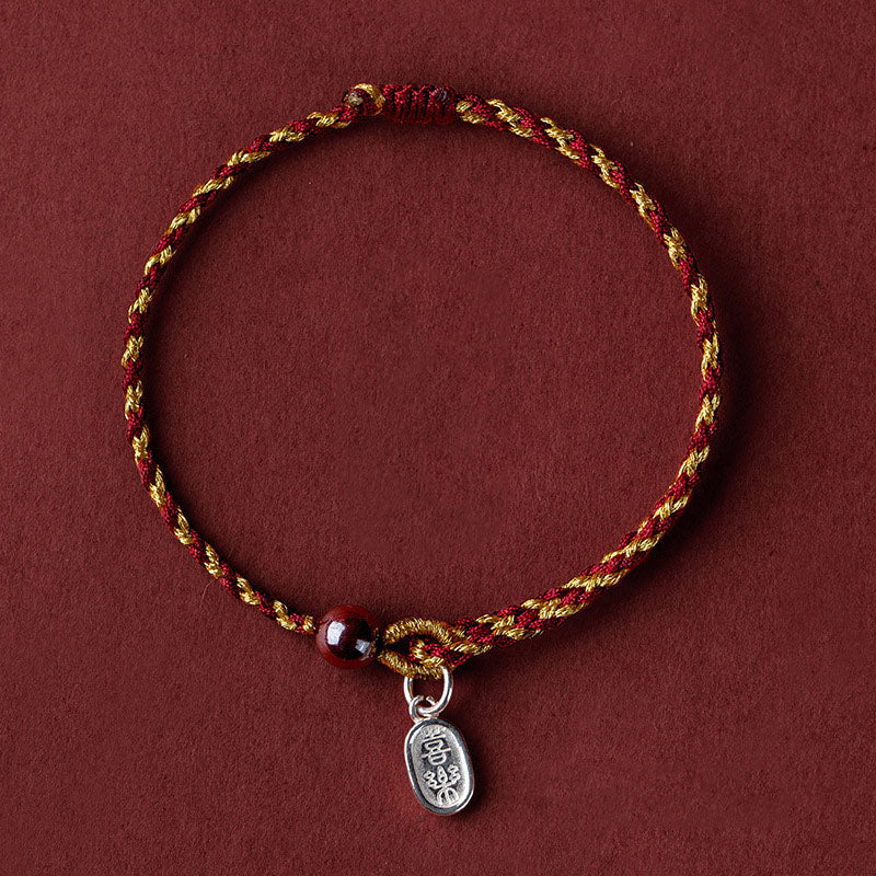 Bransoletka warkoczowa z Buddha Stones wykonana ręcznie z czerwonego złota, sznurka, lotosu, pokoju i radości