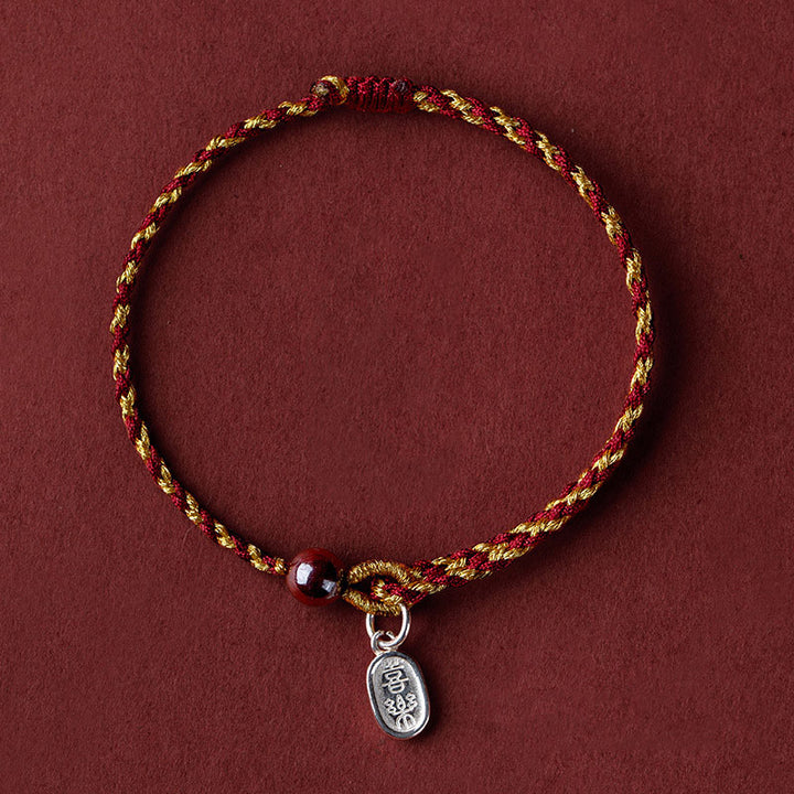 Bransoletka warkoczowa z Buddha Stones wykonana ręcznie z czerwonego złota, sznurka, lotosu, pokoju i radości