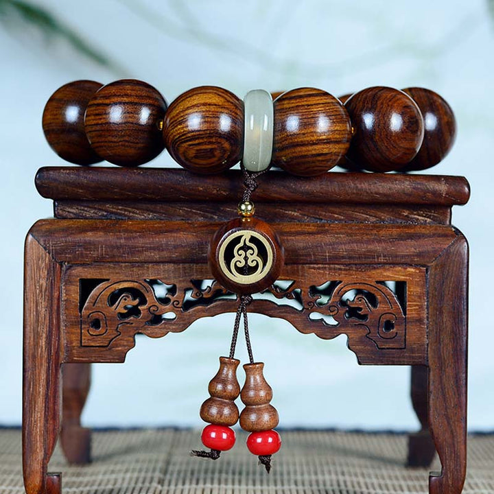 Bransoletka z zawieszkami Buddha Stones Rosewood Warmth Calm Gourd