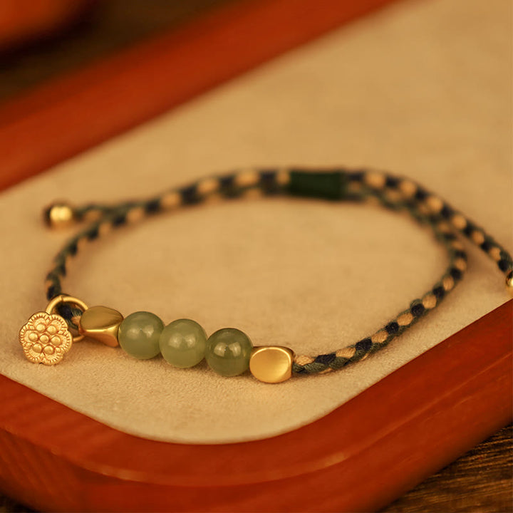 Bransoletka z ręcznie robionego hetian jadeitu z zawieszką lotosu i Buddha Stones, pleciona, szczęście