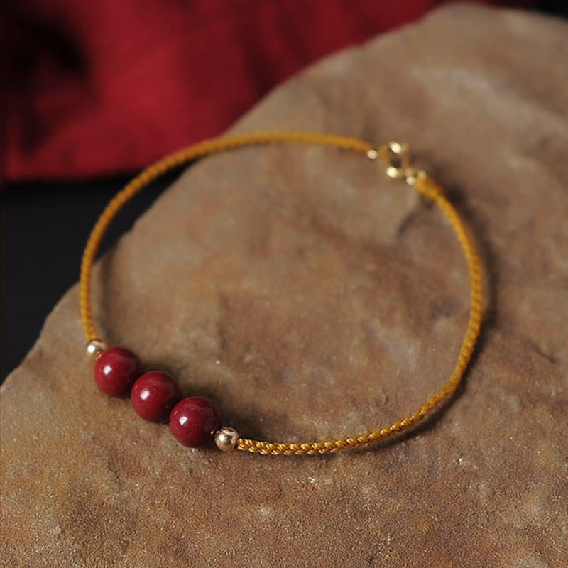 Bransoletka z naturalnego sznurka błogosławieństwa z Buddha Stones 14K pozłacana cynobrem
