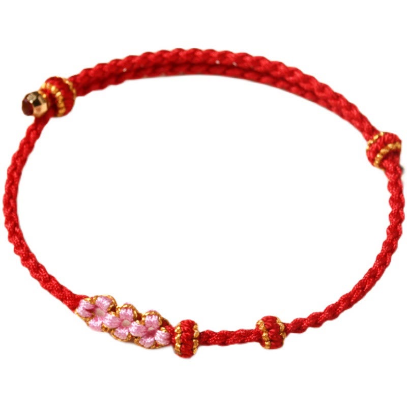 Bransoletka z plecionej liny z Buddha Stones wykonana ręcznie z brzoskwiniowego kwiatu