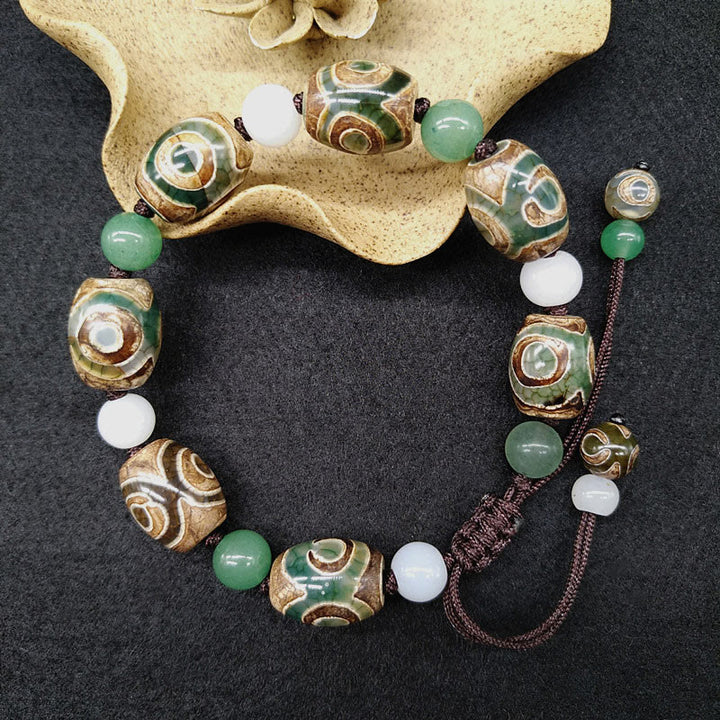 Buddha Stones Tybetańskie Trójoczne Dzi Koraliki Ochrona Szczęścia Bransoletka Pleciona
