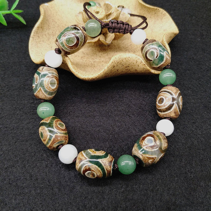 Buddha Stones Tybetańskie Trójoczne Dzi Koraliki Ochrona Szczęścia Bransoletka Pleciona