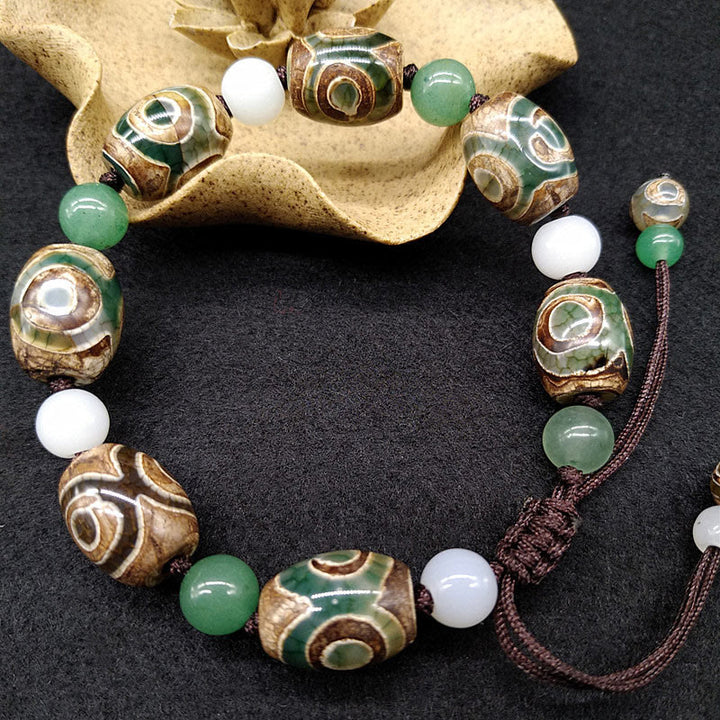 Buddha Stones Tybetańskie Trójoczne Dzi Koraliki Ochrona Szczęścia Bransoletka Pleciona
