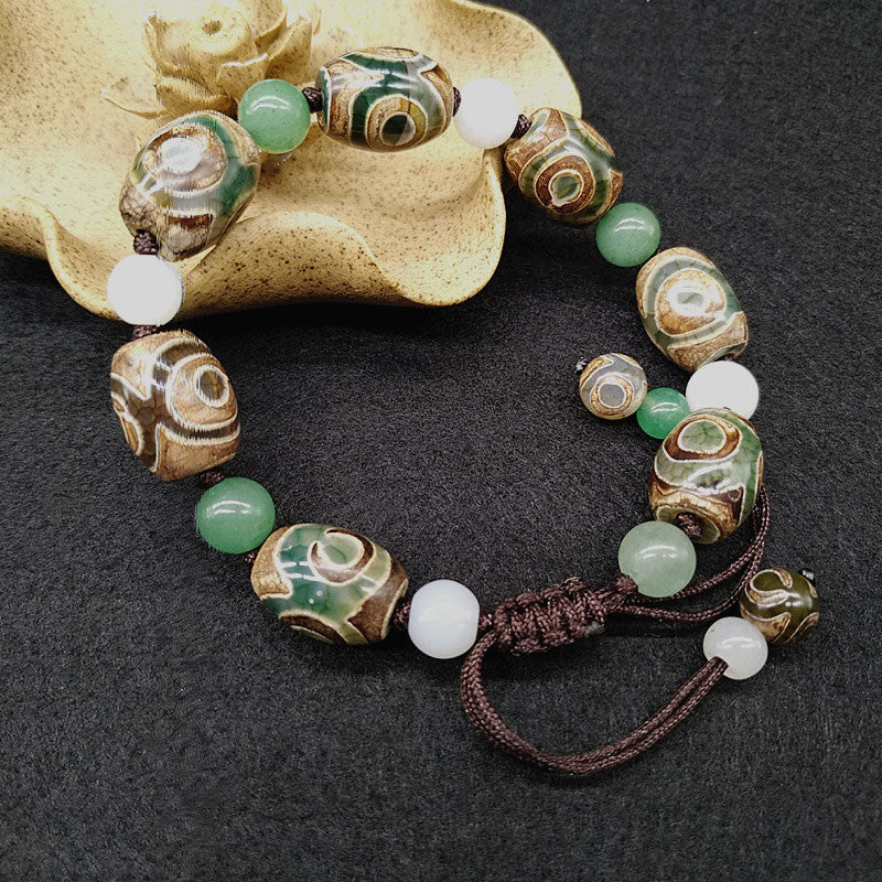 Buddha Stones Tybetańskie Trójoczne Dzi Koraliki Ochrona Szczęścia Bransoletka Pleciona