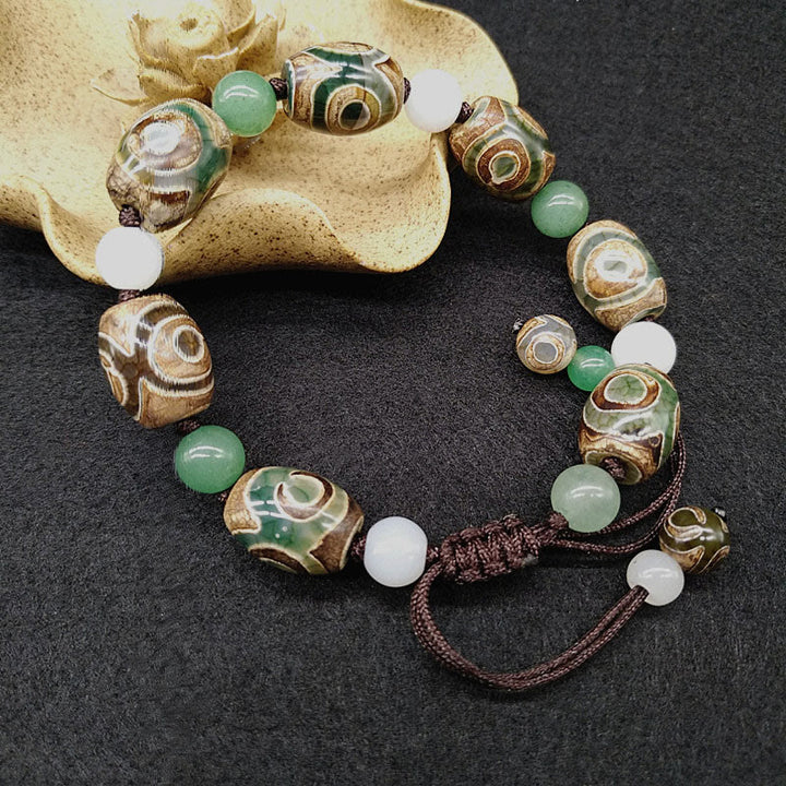 Buddha Stones Tybetańskie Trójoczne Dzi Koraliki Ochrona Szczęścia Bransoletka Pleciona
