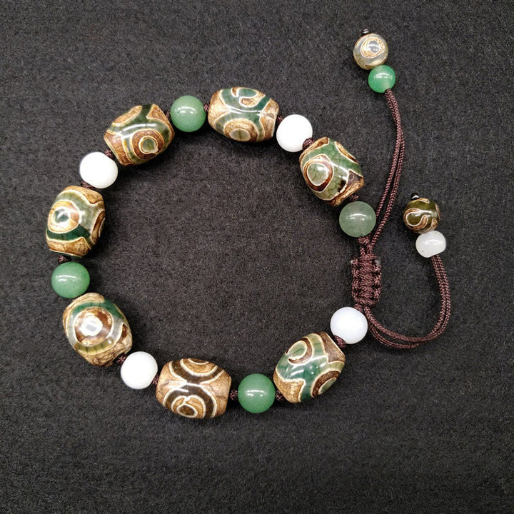 Buddha Stones Tybetańskie Trójoczne Dzi Koraliki Ochrona Szczęścia Bransoletka Pleciona