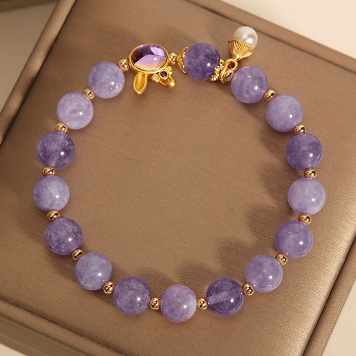 Bransoletka szczęścia z naturalnego fioletowego kwarcytu z Buddha Stones - image 4