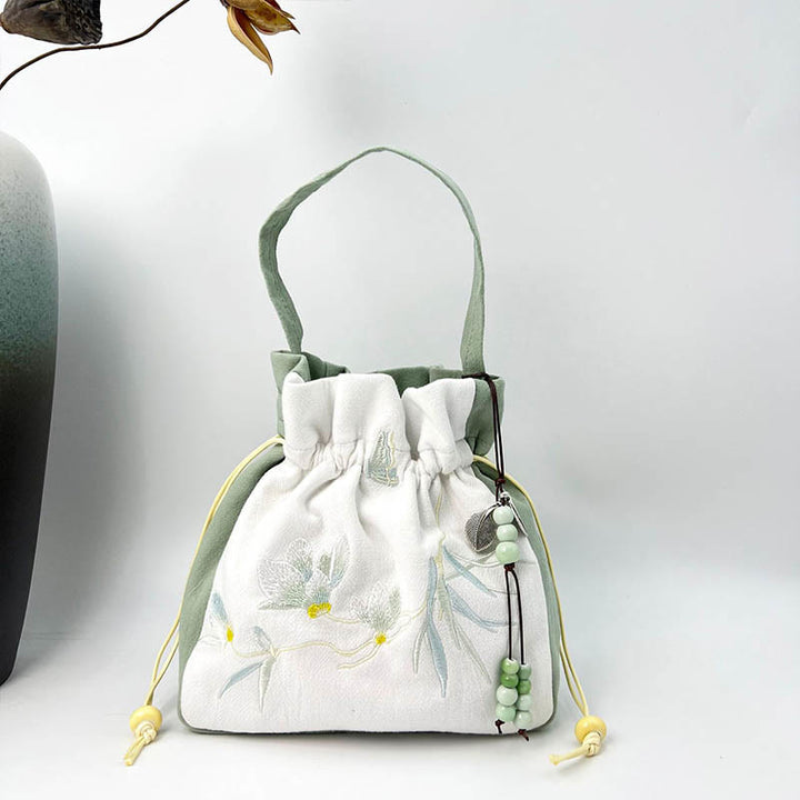 Buddha Stones haftowany motyl lotos magnolia bawełna len torba typu crossbody torba na ramię torebka
