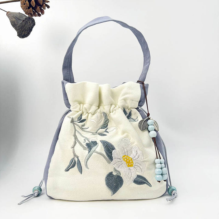 Buddha Stones haftowany motyl lotos magnolia bawełna len torba typu crossbody torba na ramię torebka
