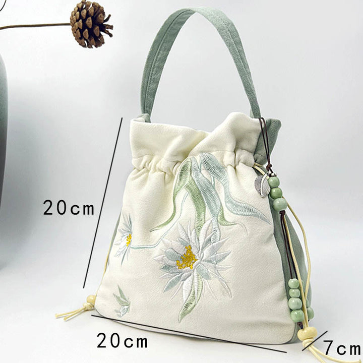 Buddha Stones haftowany motyl lotos magnolia bawełna len torba typu crossbody torba na ramię torebka