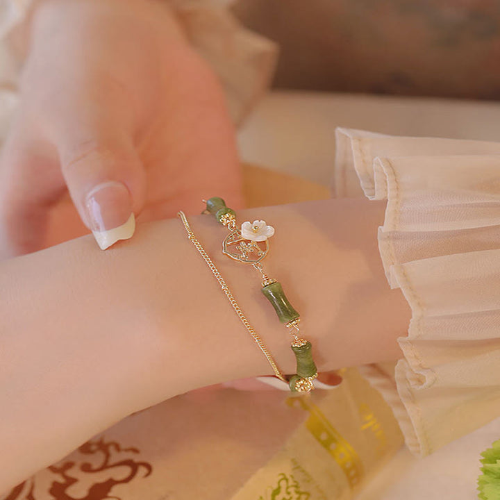 Buddha Stones 14k pozłacana miedź peridot bambus kwiat bogactwo podwójna bransoletka