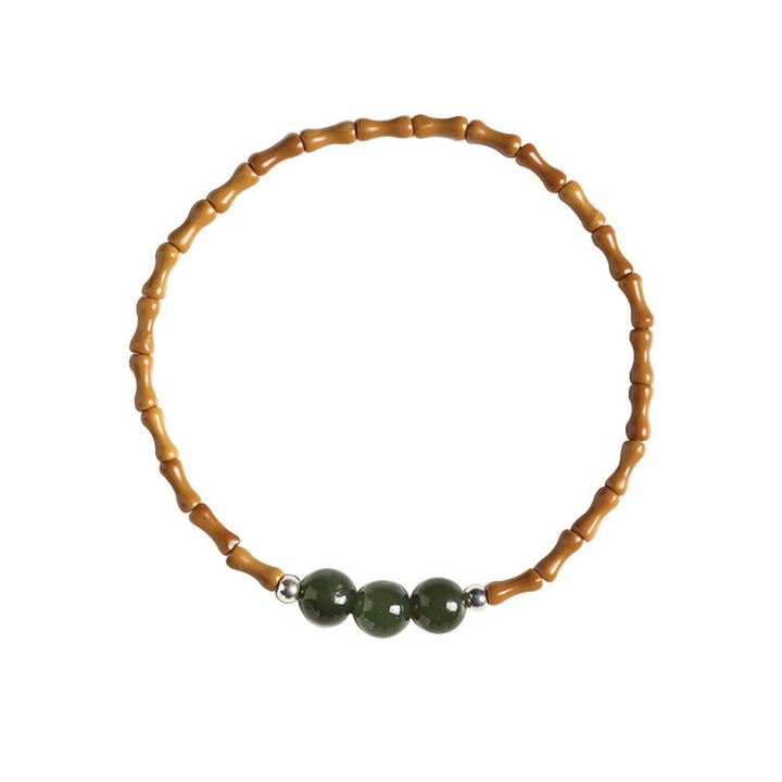 Buddha Stones Naturalne Oliwki Pestki Bambusa Wzór Hetian Jade Koraliki Bransoletka Szczęścia