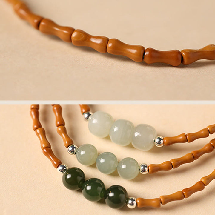 Buddha Stones Naturalne Oliwki Pestki Bambusa Wzór Hetian Jade Koraliki Bransoletka Szczęścia