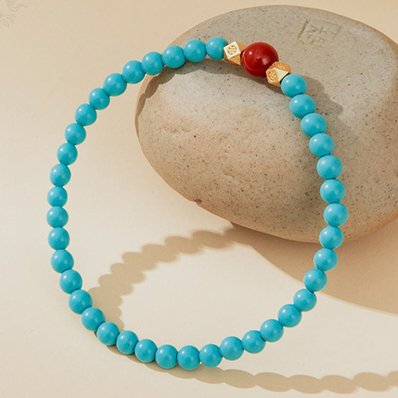 Bransoletka ochronna z Buddha Stones w kolorze turkusowym i czerwonym agatem