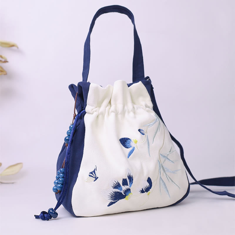 Buddha Stones haftowany motyl lotos magnolia bawełna len torba typu crossbody torba na ramię torebka