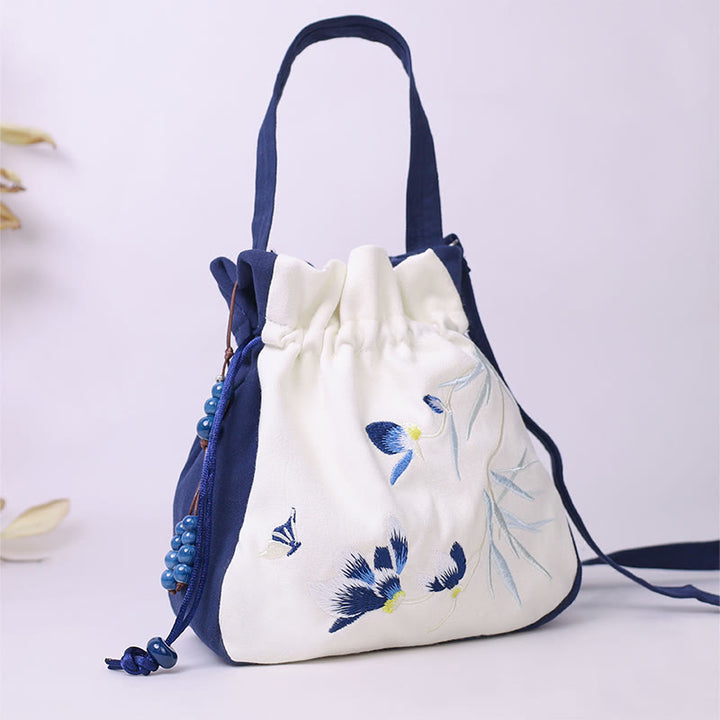 Buddha Stones haftowany motyl lotos magnolia bawełna len torba typu crossbody torba na ramię torebka