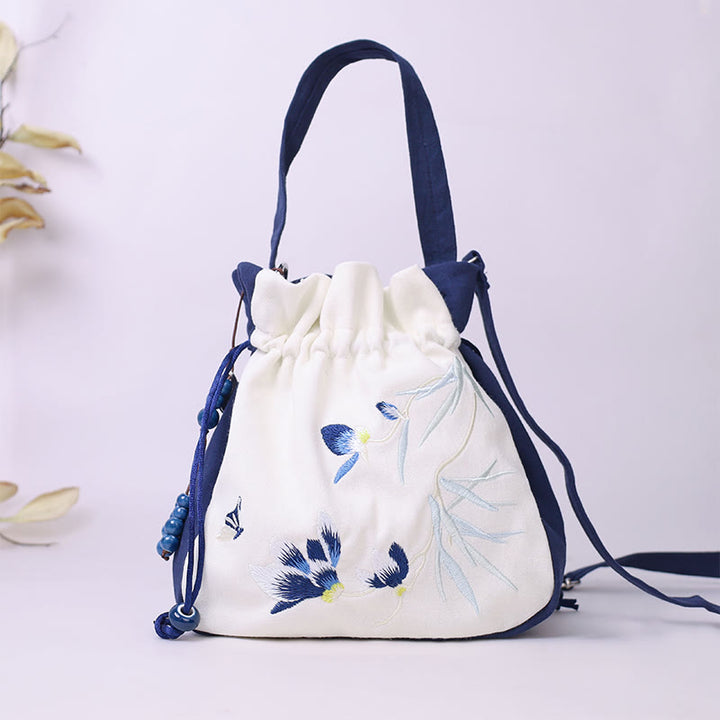 Buddha Stones haftowany motyl lotos magnolia bawełna len torba typu crossbody torba na ramię torebka