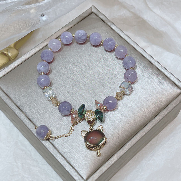 Bransoletka szczęścia z naturalnego fioletowego jadeitu z zawieszką z Buddha Stones