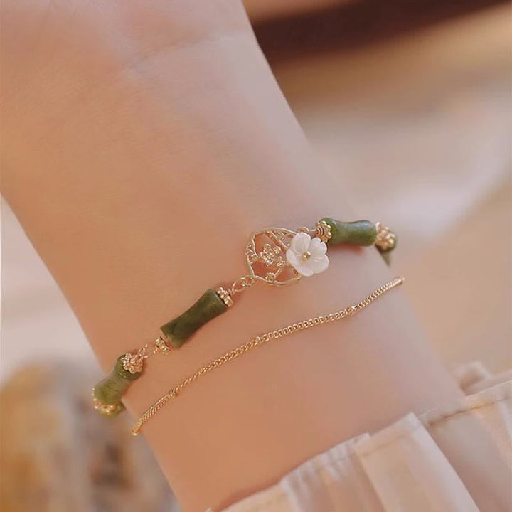 Buddha Stones 14k pozłacana miedź peridot bambus kwiat bogactwo podwójna bransoletka