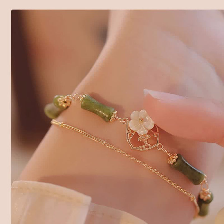 Buddha Stones 14k pozłacana miedź peridot bambus kwiat bogactwo podwójna bransoletka