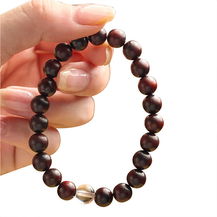 Bransoletka ochronna z małych liści z czerwonego drzewa sandałowego i białego kryształu z Buddha Stones