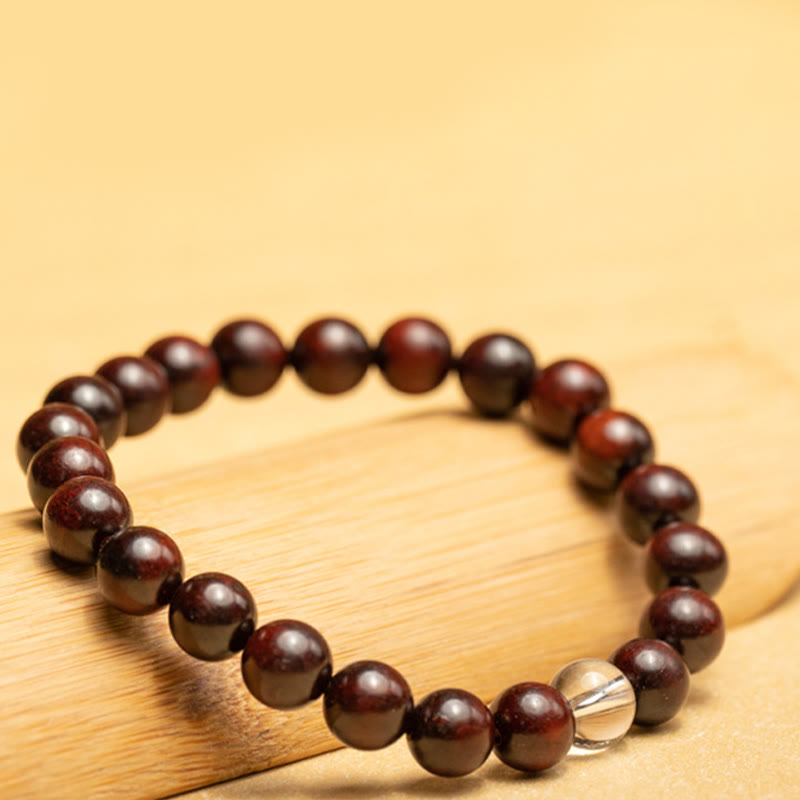 Bransoletka ochronna z małych liści z czerwonego drzewa sandałowego i białego kryształu z Buddha Stones