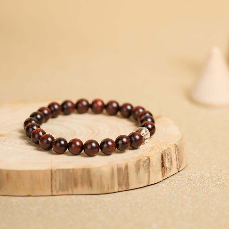 Bransoletka ochronna z małych liści z czerwonego drzewa sandałowego i białego kryształu z Buddha Stones