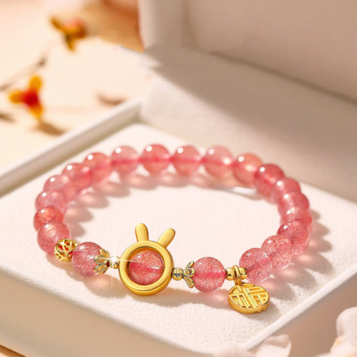 Bransoletka lecznicza z Buddha Stones z kwarcu truskawkowego Fu Character Pink