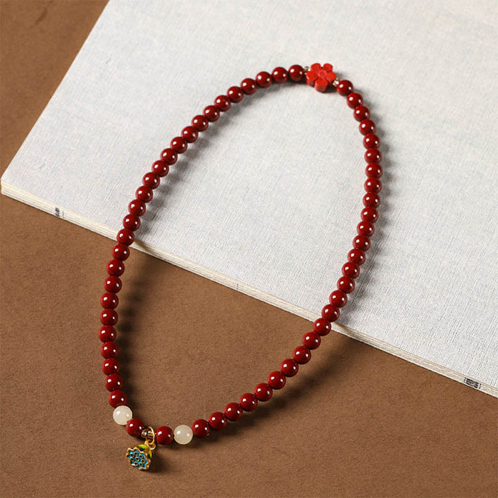 Bransoletka z podwójnym owinięciem i błogosławieństwem Buddha Stones Cinnabar Lotus Charm